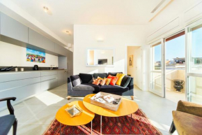 Bright 1BR Apartment w Balcony & Mamad 10 min Walk from Beach by Sea N' Rent